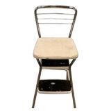 Vintage Cosco Style step stool chair features a ch