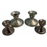 Four Weighted Sterling Candle Holders