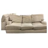 Beige Upholstered Three Cushion Sofa