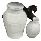 23' Two white terracotta vases