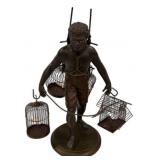 Figure with Bird Cages