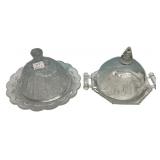 Two Pressed Glass Covered Butter Dishes