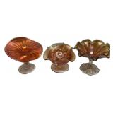 Three Marigold Carnival Glass Compotes