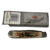 Case 6254 SS Amber Trapper Folding Knife