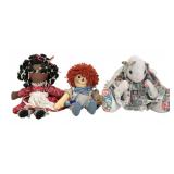 Lot includes a black cloth doll with yarn hair in