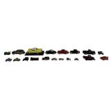 Collection of 17 vintage and modern toy vehicles.