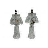 Matching pair of small clear cut glass lamps with