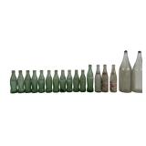 Group of 16 vintage bottles. Includes 11 green