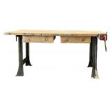 Butcher Block Top workbench with metal legs.