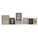 Collection of seven small framed art pieces.
