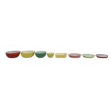 Assorted lot of vintage Pyrex kitchenware.