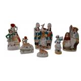 Staffordshire group: Sailor, French flag & seated
