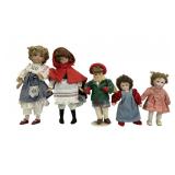 Lot includes six dolls of varying sizes. Includes