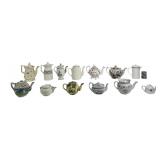Damaged teapots: Pink luster / Gandy Dutch /