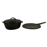 Two-piece lot of vintage cast iron cookware.