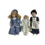 Group includes: one blonde doll in a blue