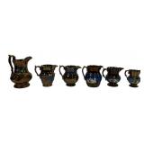 5 copper luster pitchers: 3.5' to 4' dia., 4.5' to