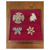 Set of brooches, Maltese cross, penguin,