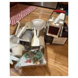 Misc kitchen lot - funnels, measuring cups,