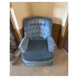 Blue pivoting and rocking chair