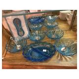 Blue dishes & souvenir spoons
