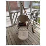 Wicker outdoor chair and leg rest, vacuum, and