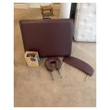 Red massage chair with accessories