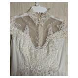 Vintage wedding dress appears to be size S/M