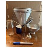 Sieve/colander with holder, milk bottle with