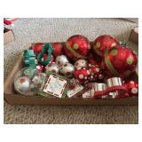 Red plastic Christmas ornaments with glitter and