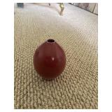 Oxblood MCM bud vase with illegible signature
