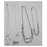 Four Silver Tone Rhinestone Necklaces