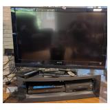 SONY 47' TV, TV Stand, VCR & DVD Player w/ Remotes