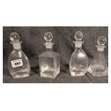 4 Small Decanters or Perfume Bottles