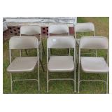 Six Metal Folding Chairs