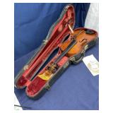 Vintage violin needs repair with accessories in
