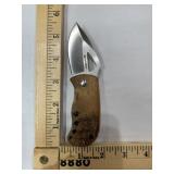Sarge pocket knife, wood grain handle, metal clip