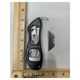 Husky Utility blade with bottle opener, safety