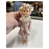 8-inch vintage Colonial doll with one loose leg