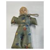 Vintage stuffed 8-inch doll with plaster head