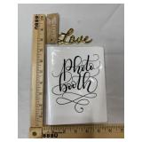 Small photo book and Goldtone bottle opener that