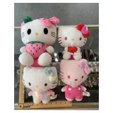 Lot of 4 Hello Kitty plushes, signs of wear