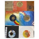 Vintage 45 records,mixed genres sixties to 90s.