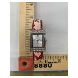 Cardini cuff watch, quartz watch, worn cuff with