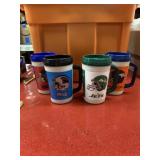Lot of 4 NFL and 7Eleven coffee mugs with lids,