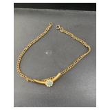 Vintage gold tone necklace with blue/clear gem