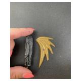 Vintage gold tone clip that needs to be repaired