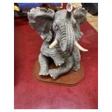 Statue of sitting elephant elder