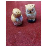 2 vintage salt and pepper shakers with misc