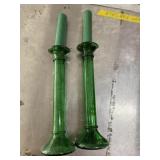 Two vintage green candlesticks with candle